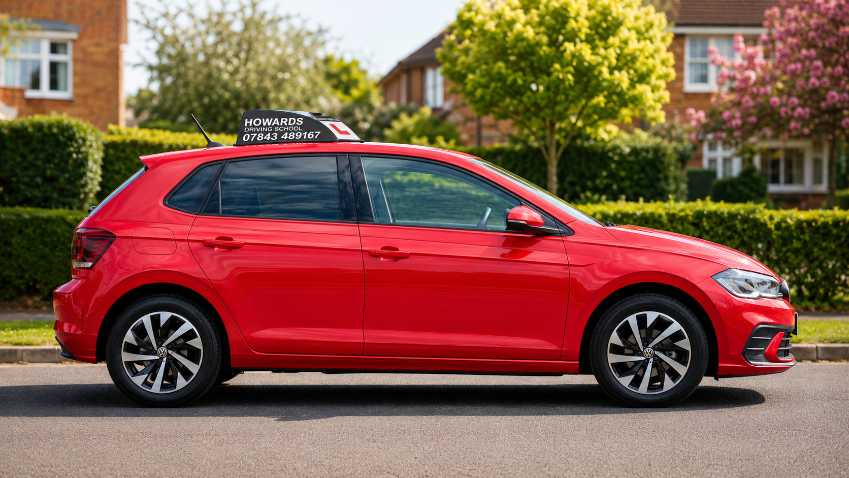 Side profile of the 2026 VW Polo driving school car
